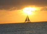 beautiful sunset with sailboat