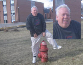 Rev. Bob jumping over the fire hydrant successfully